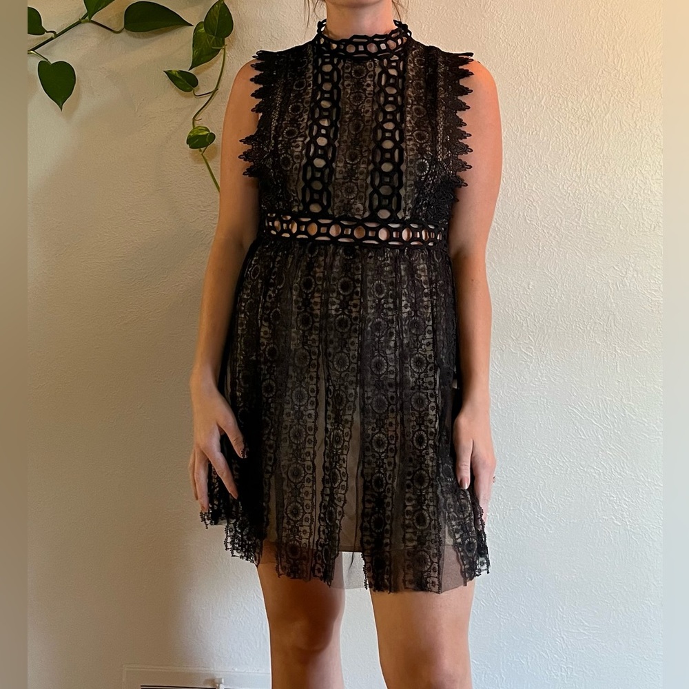 Free People party dress never worn! Nude lining with lace and cutout details!